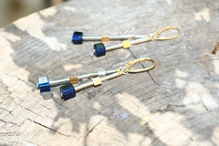 Elegante Ohrringe mit vergoldeten und rhodinierten 925 Silber und blauem Bernstein