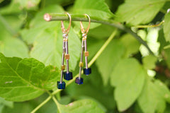 Elegante Ohrringe mit vergoldeten und rhodinierten 925 Silber und blauem Bernstein