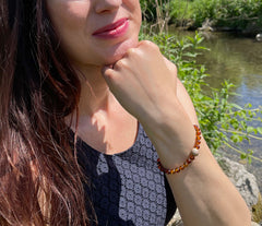 Armband mit Bernstein in Cognacfarbe und vergoldeter diamentierter Silberkugel