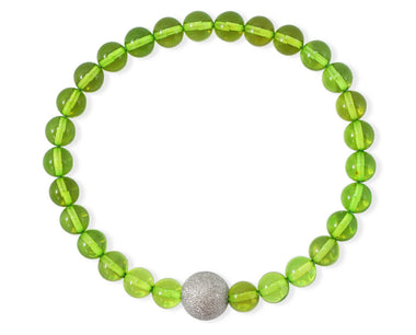 Armband mit grünem Bernstein und diamentierter Silberkugel