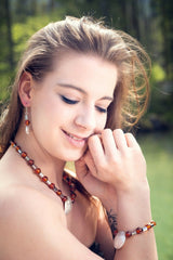 Bernstein Collier mit vergoldetem 925 Silber Diskus und Hämatitwalzen