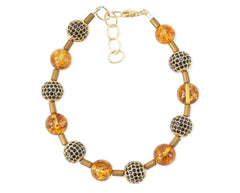 Gelbes Bernstein Armband mit glitzernden Zirkonen