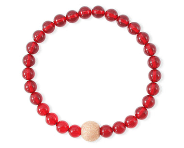 Armband mit rotem Bernstein und vergoldeter diamentierter Silberkugel
