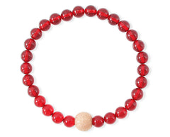 Armband mit rotem Bernstein und vergoldeter diamentierter Silberkugel