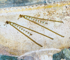 Lange vergoldete 925 Silber Ohrstecker mit facettierten Aquamarinsteinen