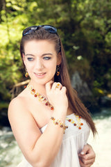 925 Silber Ohrstecker mit vergoldeten Ringen und rohem Bernstein