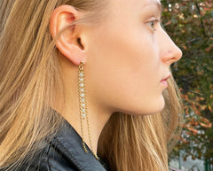 Lange vergoldete 925 Silber Ohrstecker mit facettierten Aquamarinsteinen