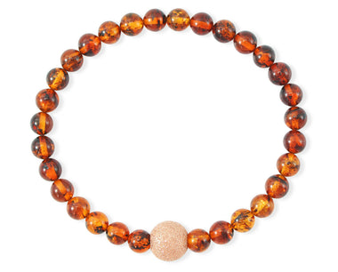 Armband mit Bernstein in Cognacfarbe und vergoldeter diamentierter Silberkugel