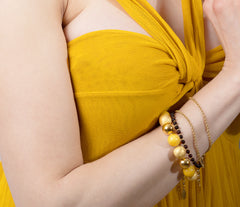 Armband mit gelbem Bernstein und vergoldeten 925 Sterling Silberkugeln