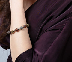 Schwarzes Bernstein Armband mit glitzernden Zirkonen