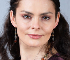 Bernstein Klappbrisuren in Braun mit glitzernden Zirkonen